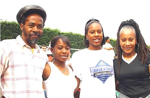 Sanya Richards (3rd from left) with father Archie, mother Sharon and her sister at the 2002 adidas Outdoor Champs.  Photo by Donna Dye.